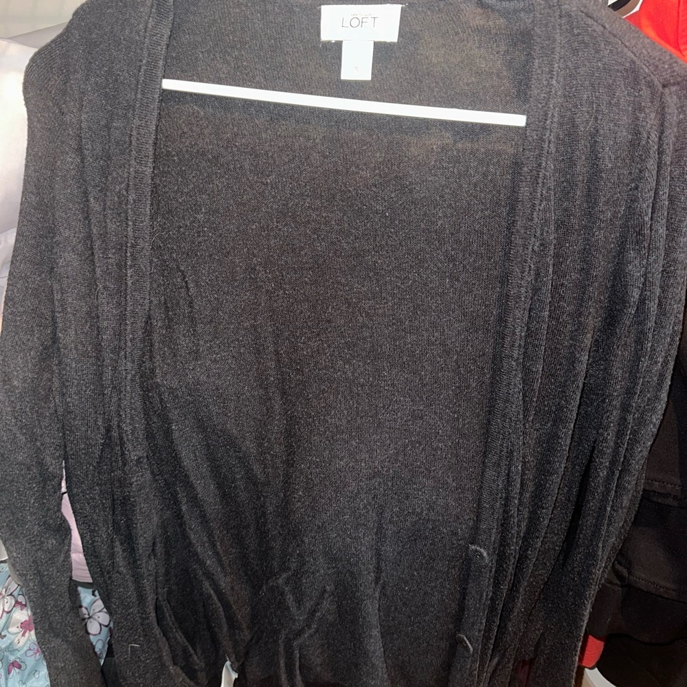 Ann Taylor loft cardigan buttons down at the bottom very cute with a shirt under